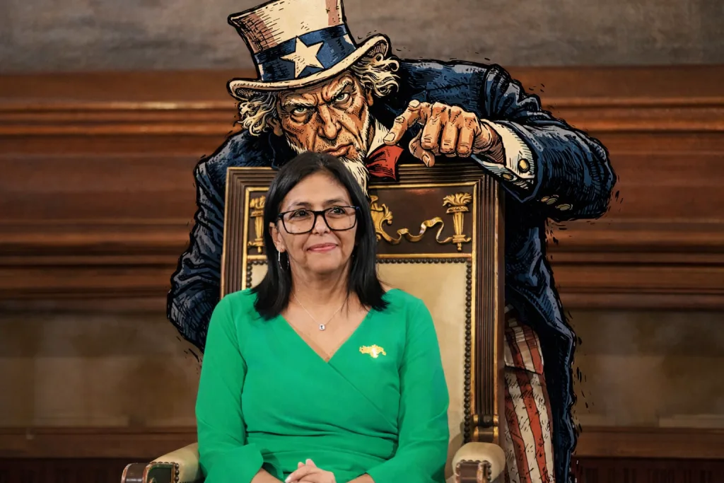Uncle Sam leans over a Delcy Rodriguez directing her government.